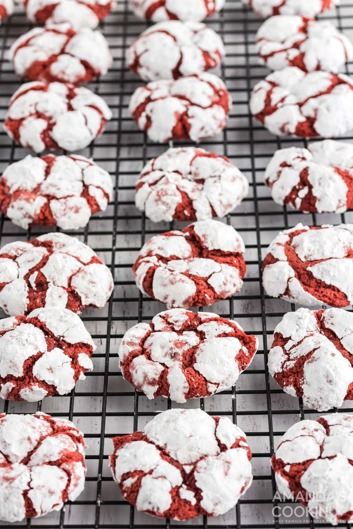 wire rack of red velvet crinkle cookies