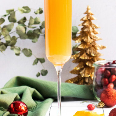 cranberry mimosa in a champagne flute