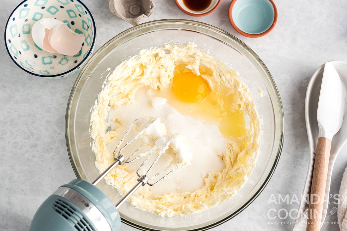 mixing eggs into cookie dough
