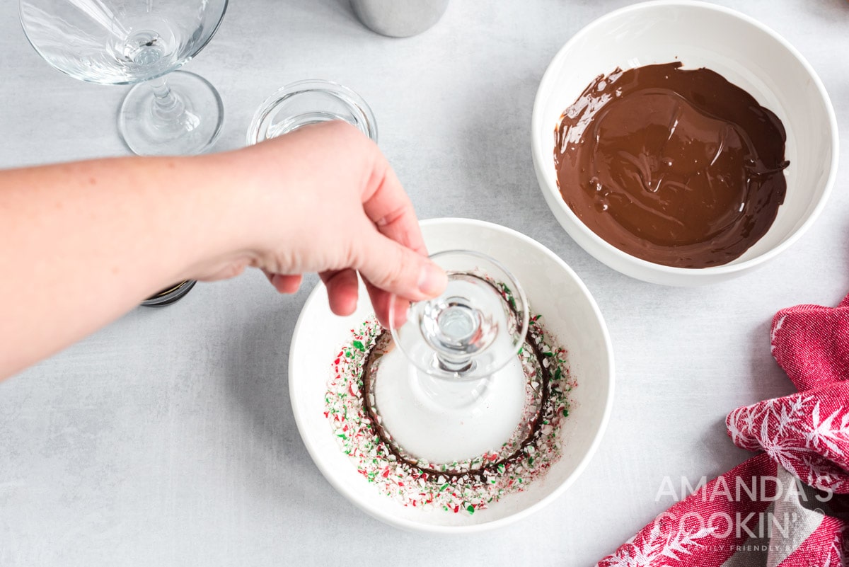 dipping martini glass rim in crushed candy canes