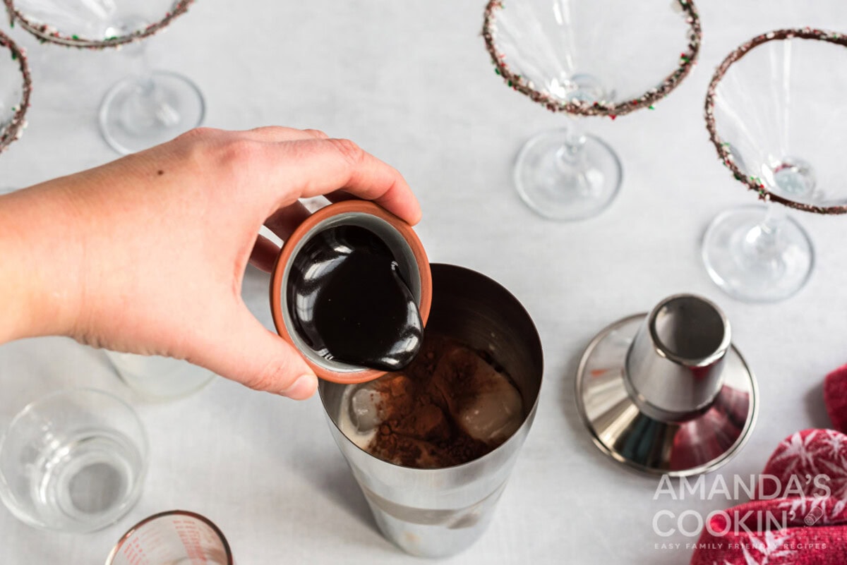 adding chocolate to cocktail shaker