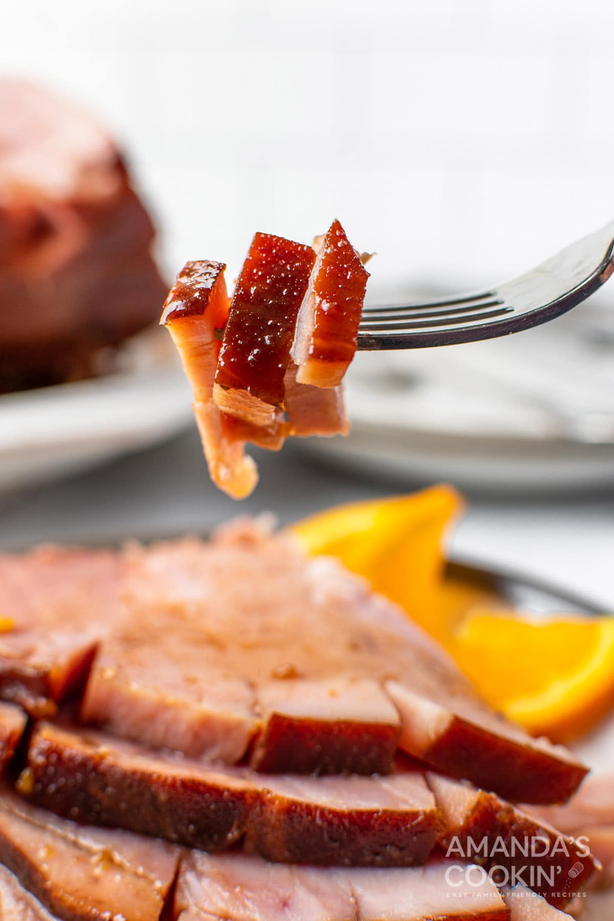 fork with ham slices