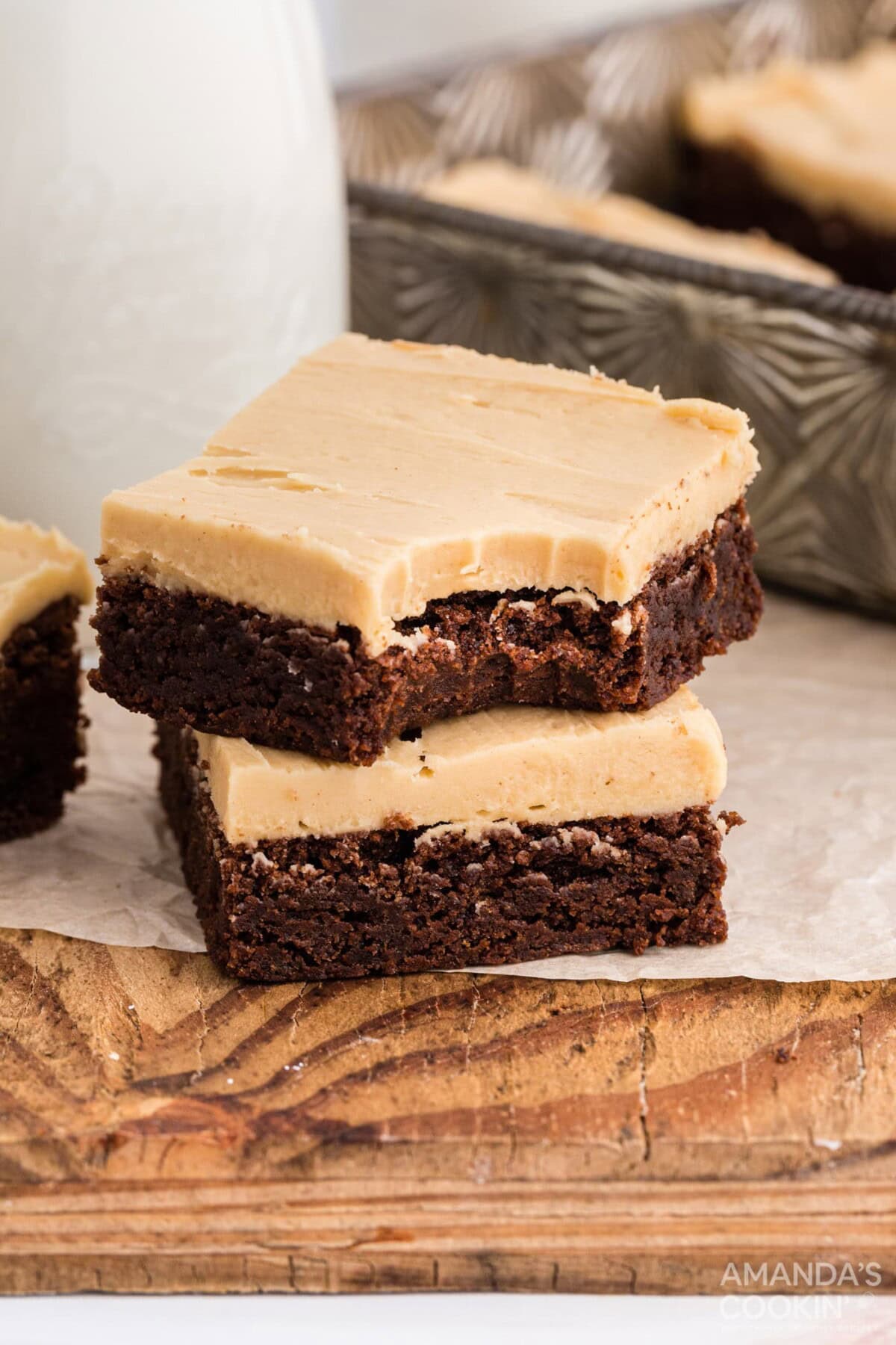 two brownies, one with a bite out of it