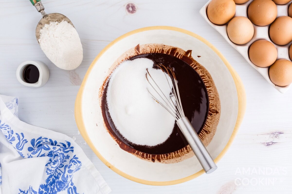 sugar in bowl of melted chocolate