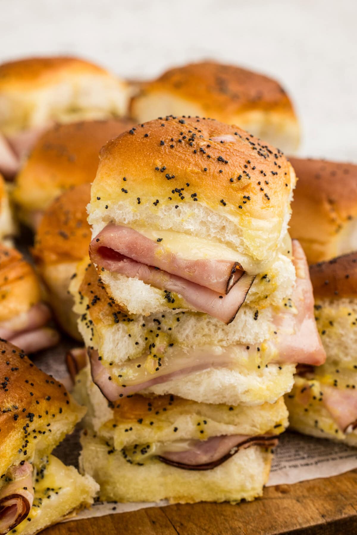 close of a stack of ham and cheese sliders