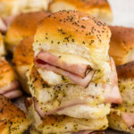 close of a stack of ham and cheese sliders