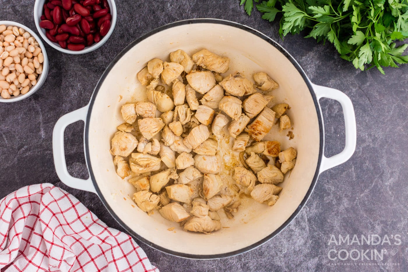 sauteeing chicken in dutch oven with olive oil