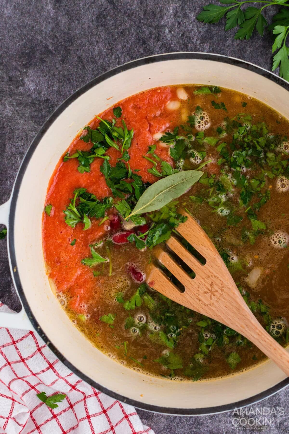 stirring ingredients in pot