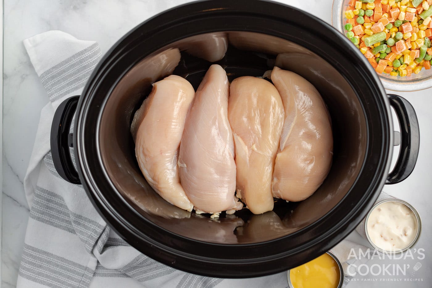 Chicken breasts in the bottom of a crockpot