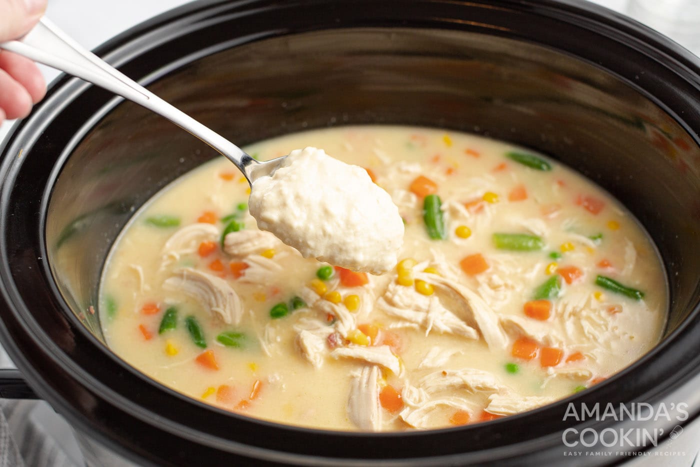 adding dumpling dough