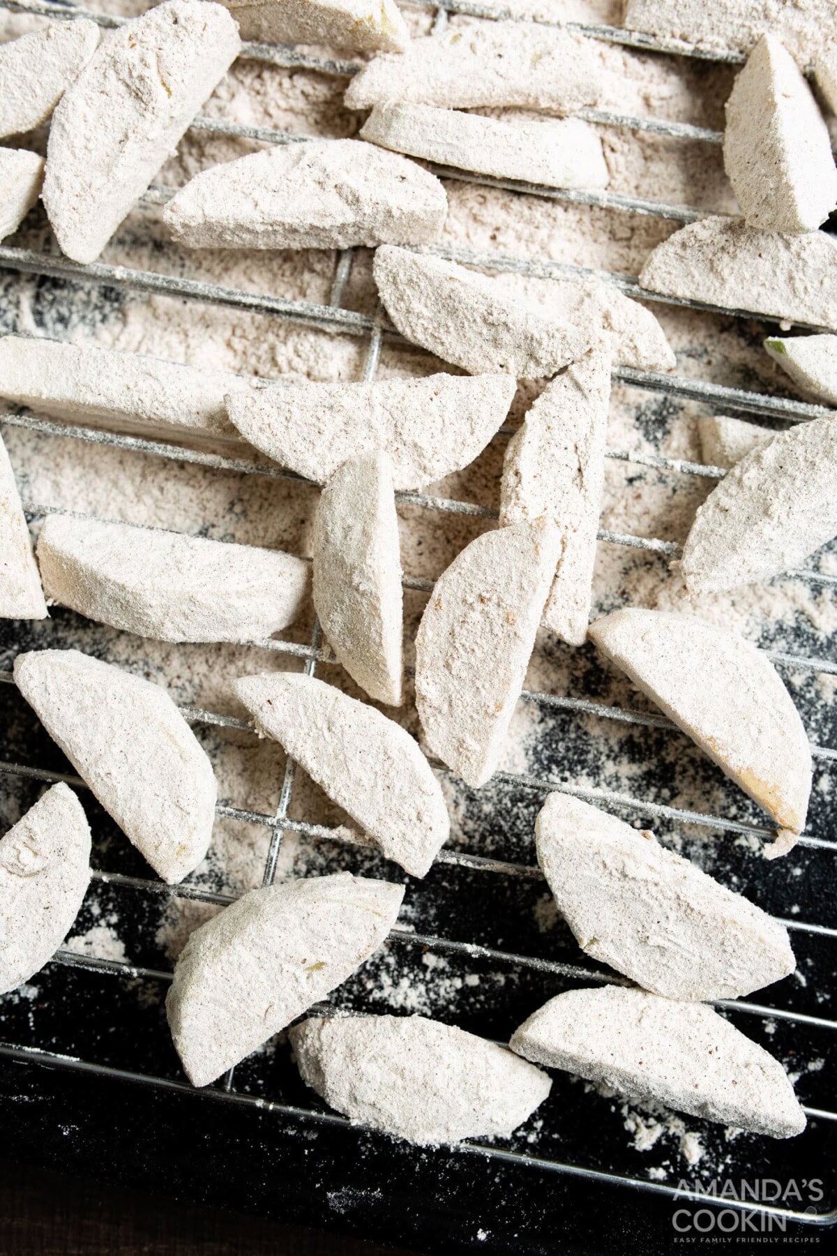 floured apples on rack