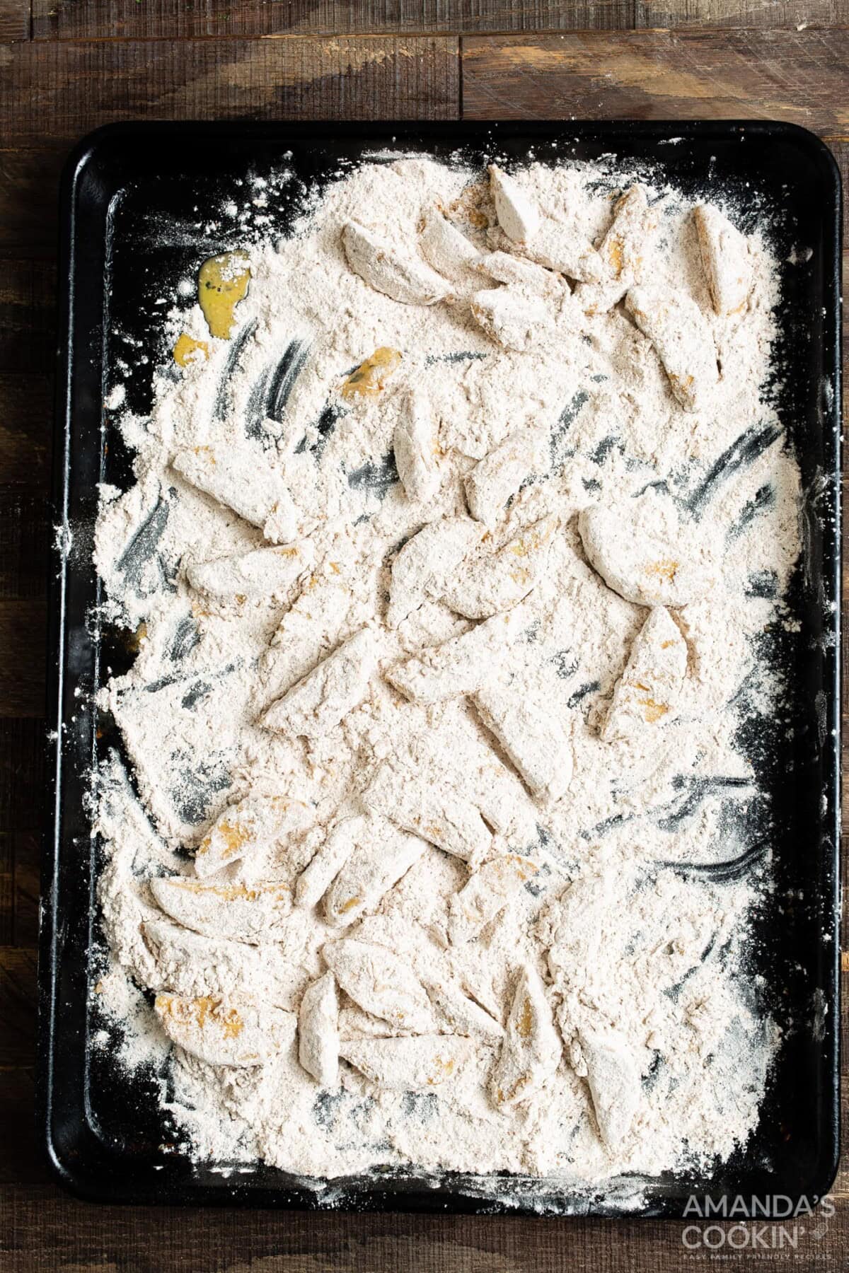 flours apple slices on baking sheet