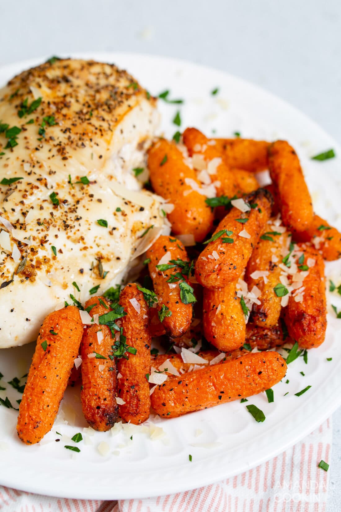 air fryer carrots and chicken on a plate