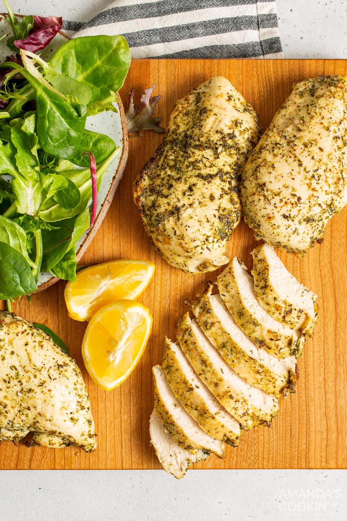 chicken breasts on a cutting board