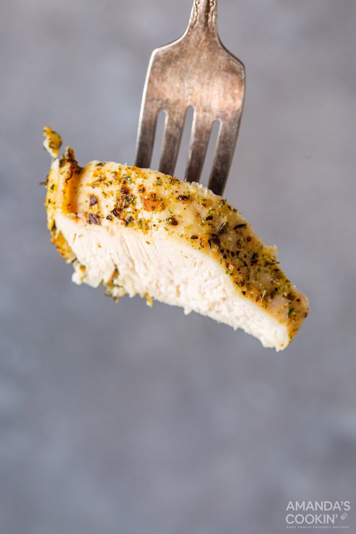 fork with a piece of chicken