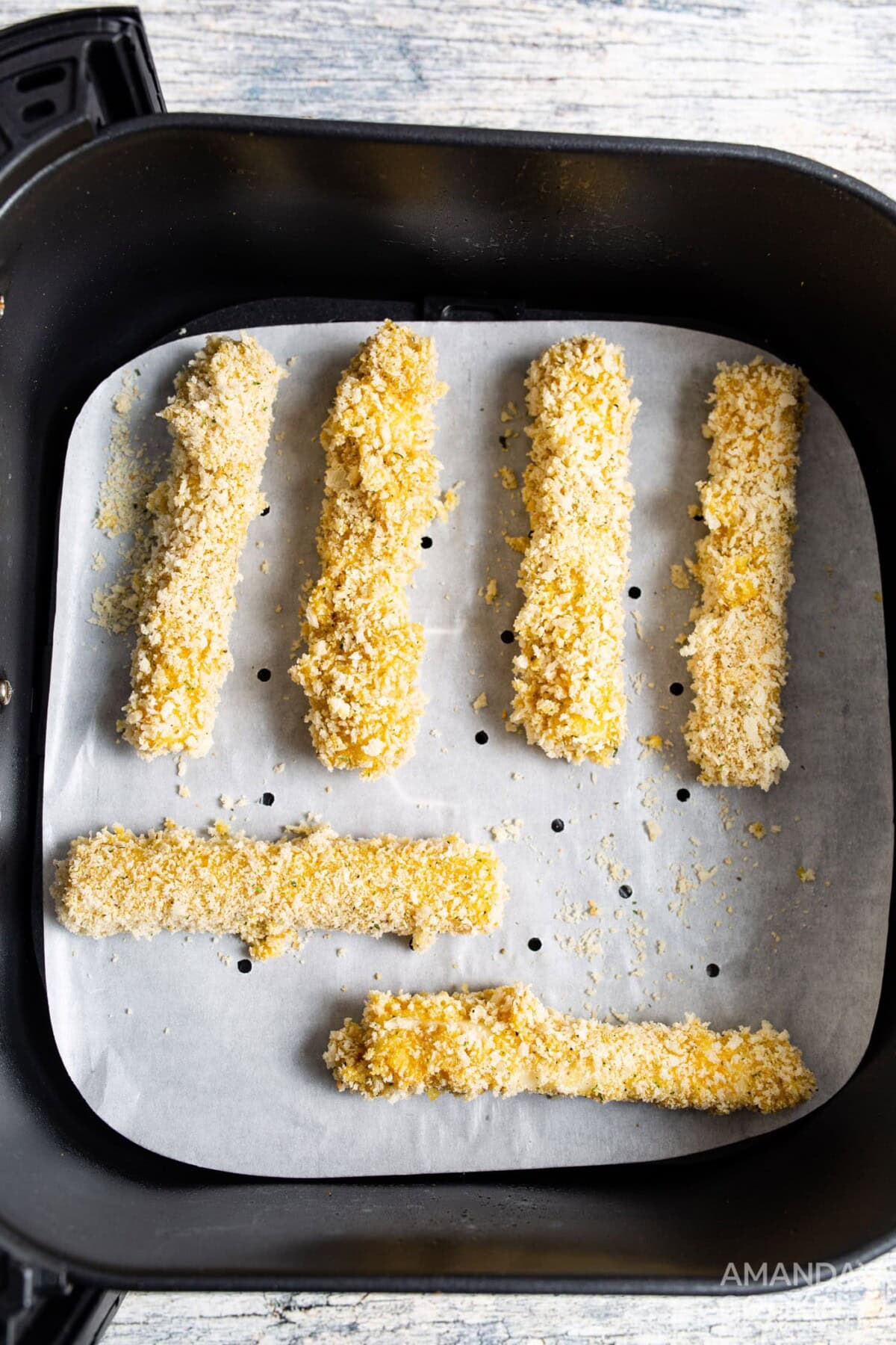 layer of mozzarella sticks in air fryer