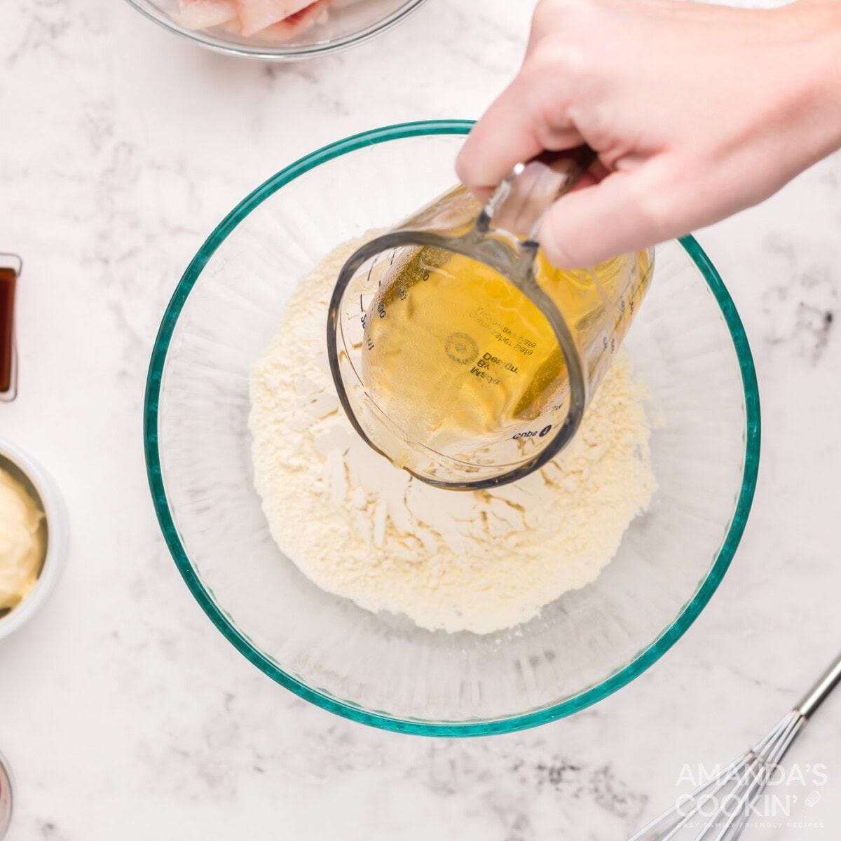 pouring beer into flour mixture