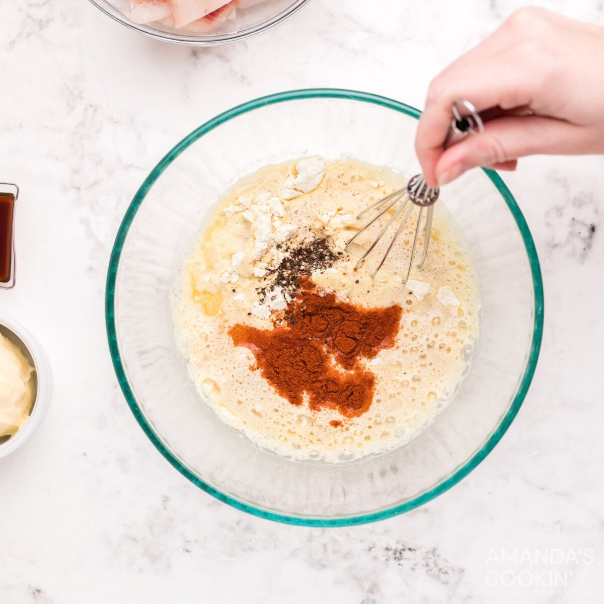 adding seasoning to batter