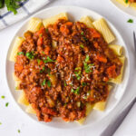 plate of bolognese sauce on pasta