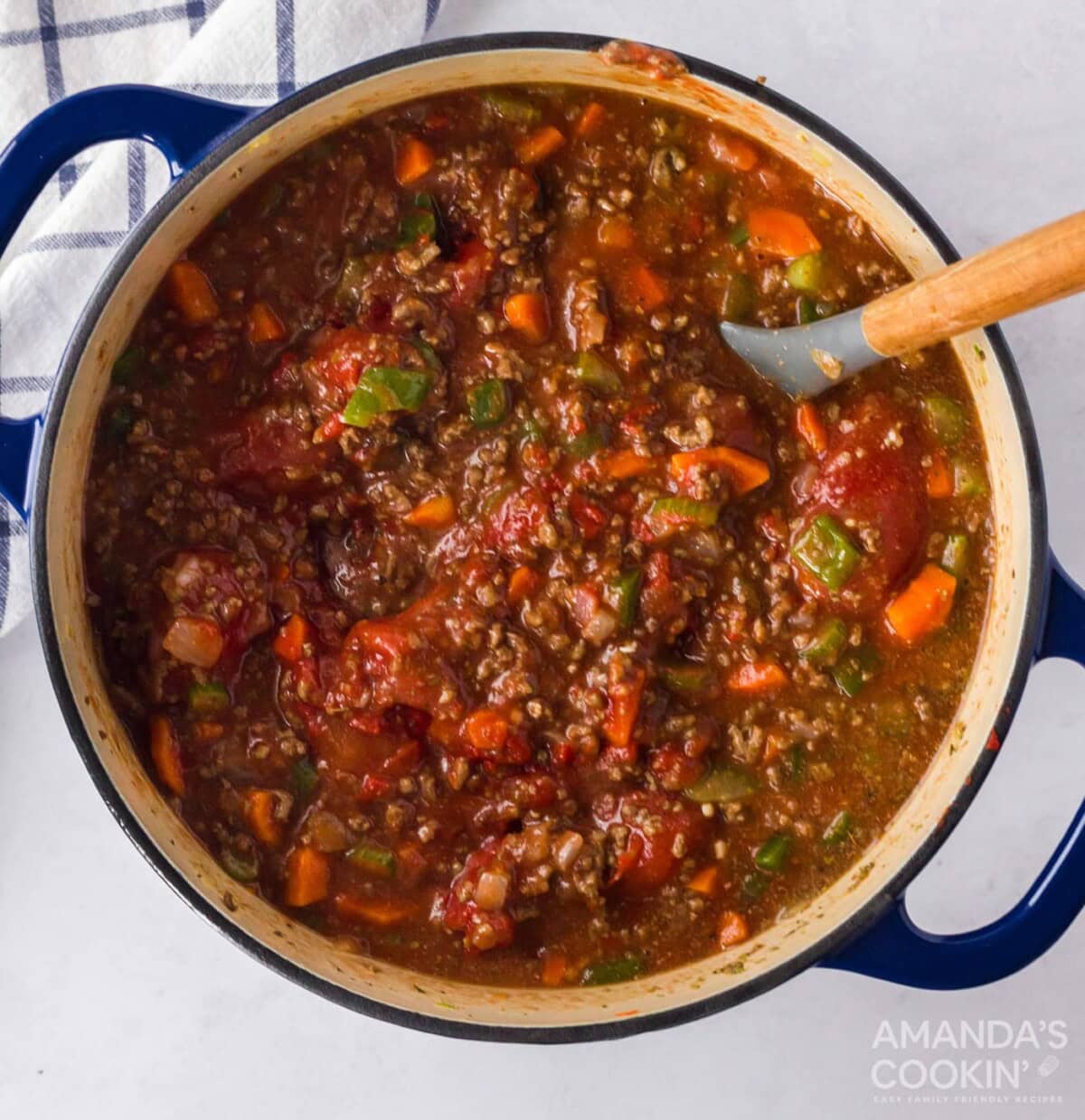 simmering pot of bolognese sauce