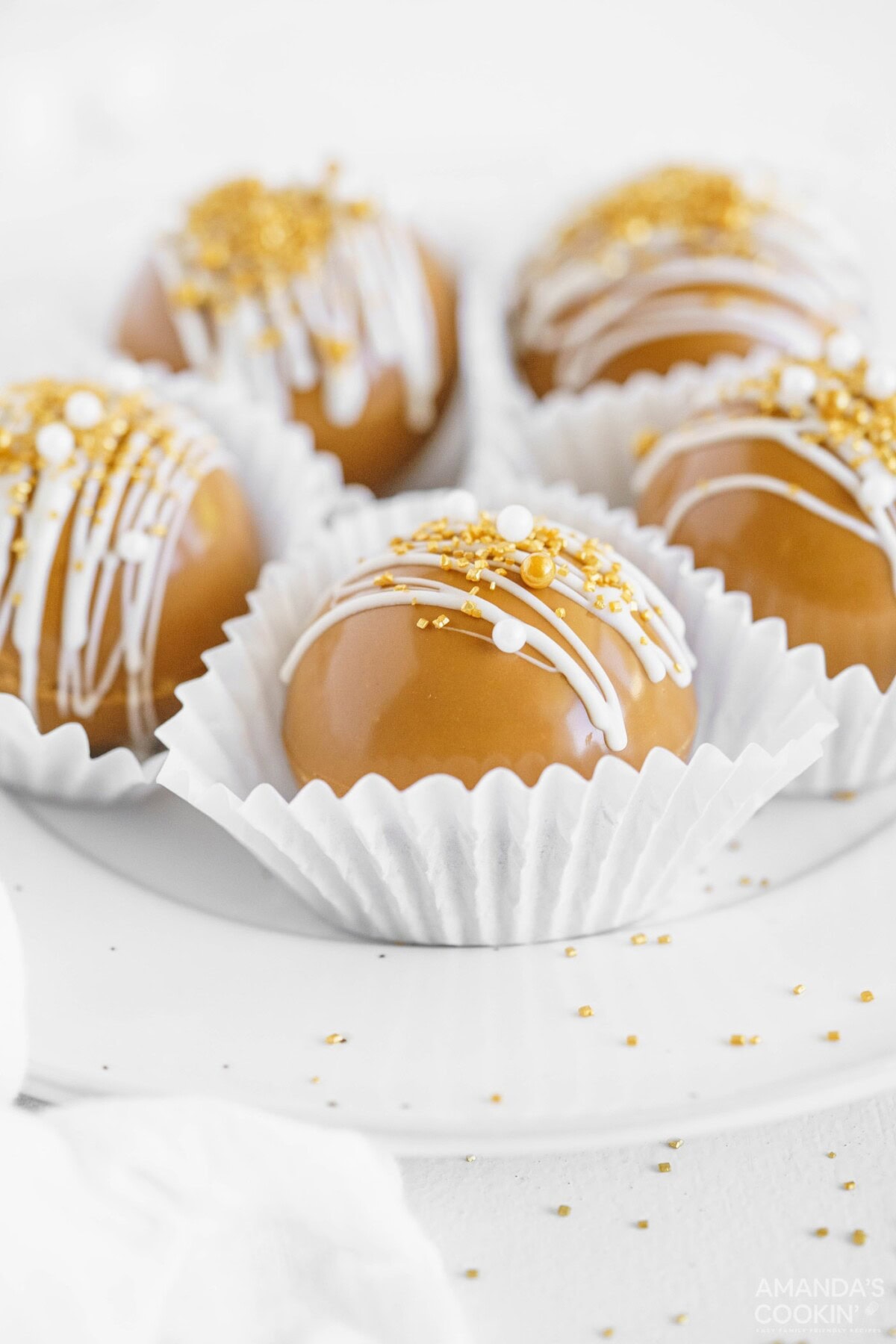 caramel hot cocoa bombs in paper liners