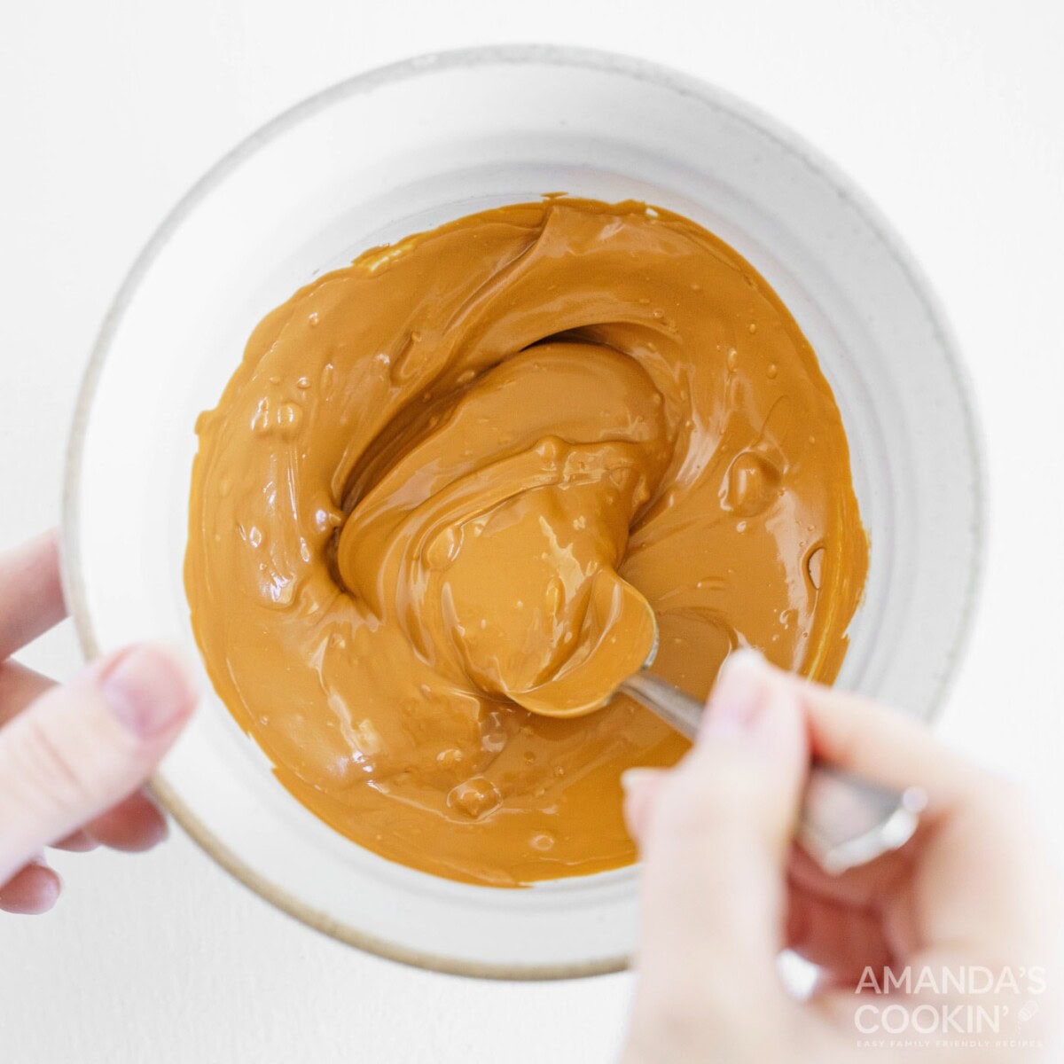 stirring caramel candy melts