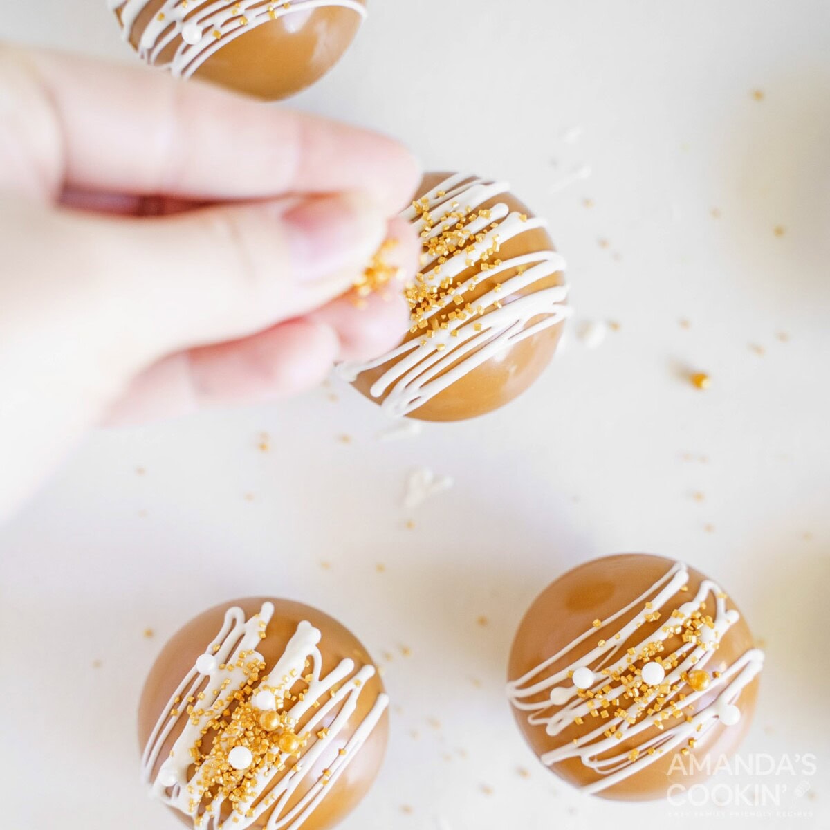adding sprinkles to hot cocoa bomb