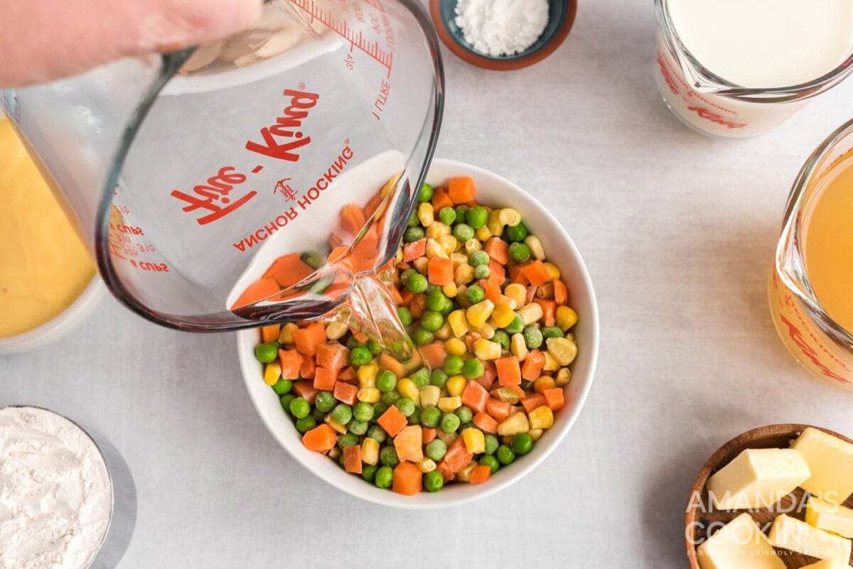 adding hot water to frozen veggies