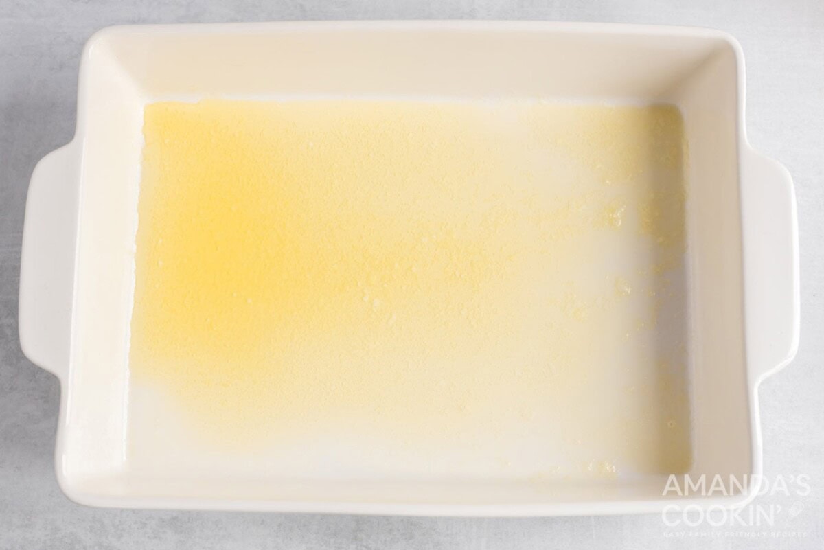 melted butter in baking dish