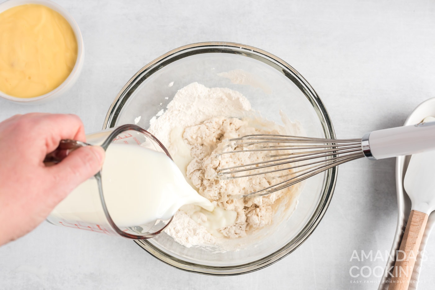 whisking milk with dry ingredients