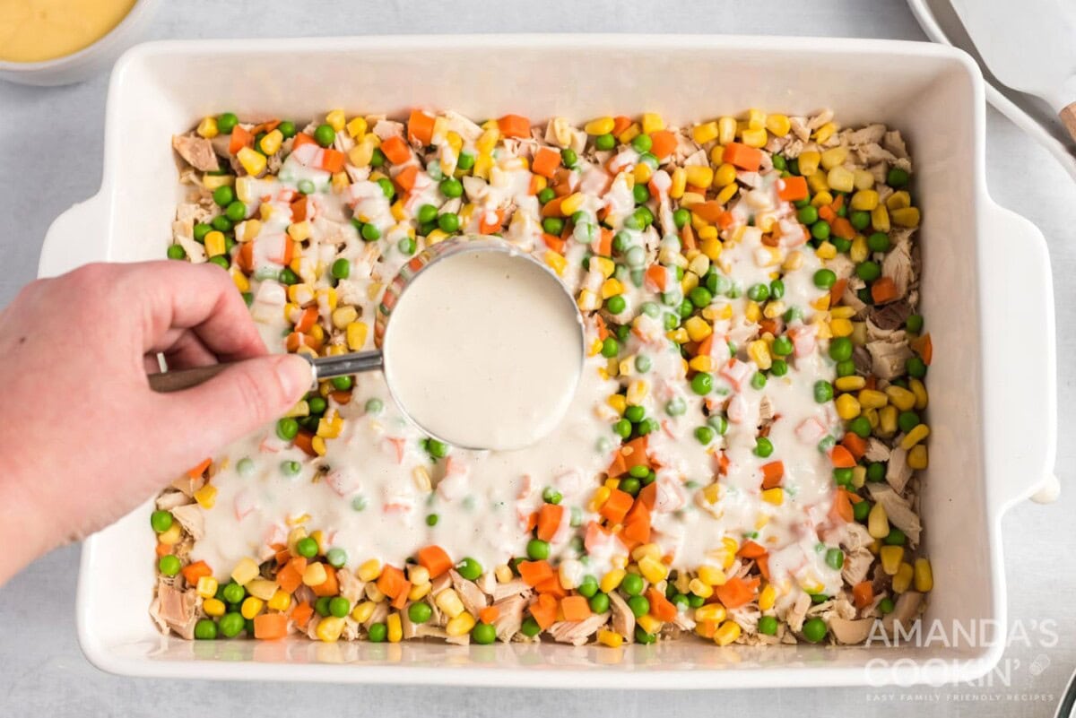 slowly add milk mixture on top of veggies