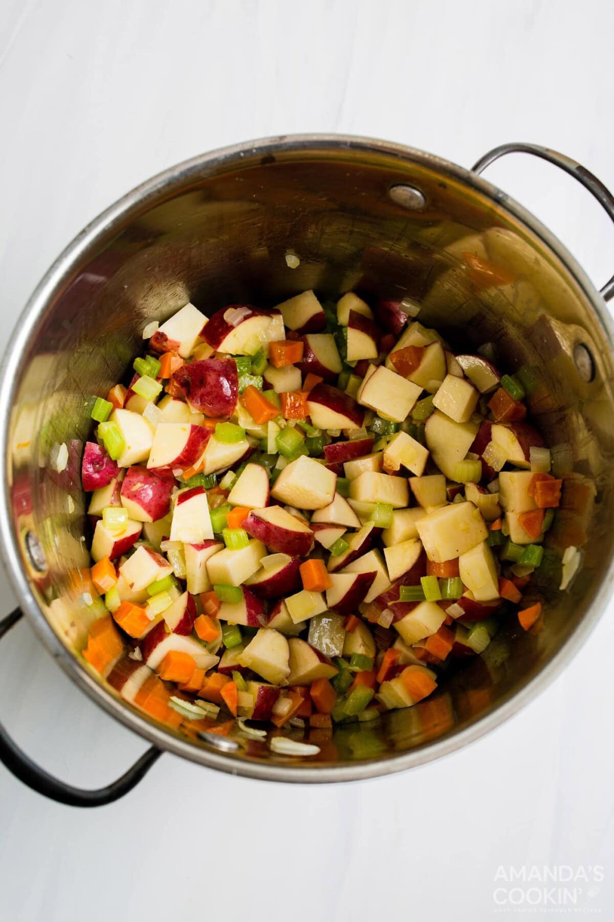 potatoes and vveggies in pot