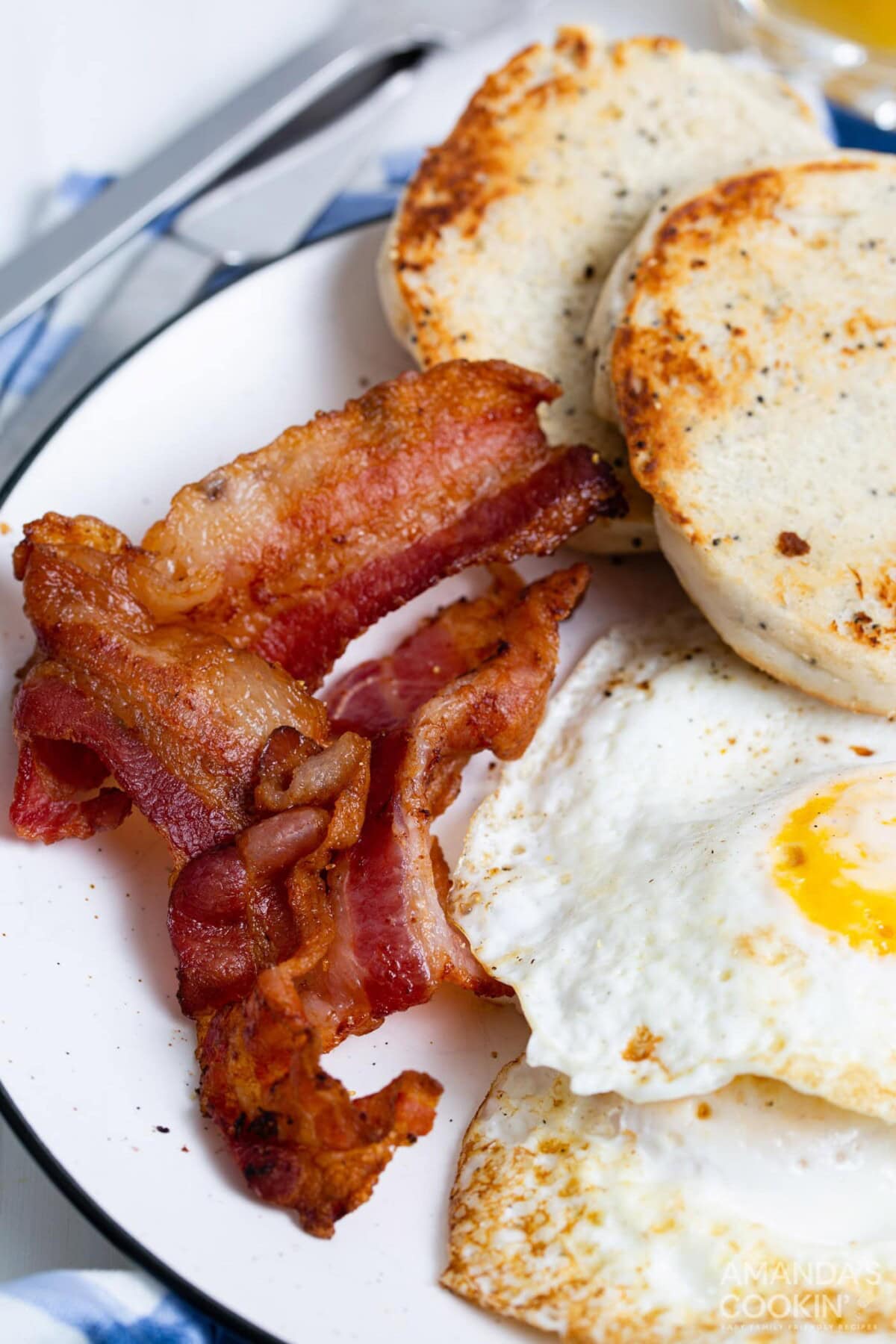 bacon on plate with eggs