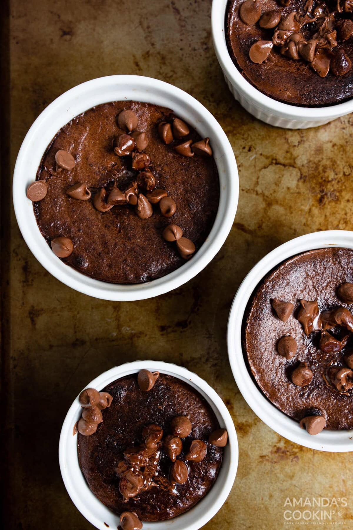 air fryer brownies in ramekins on a baking sheet