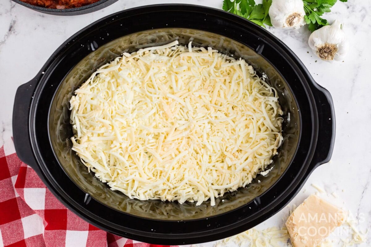 layer of mozzarella cheese in crockpot