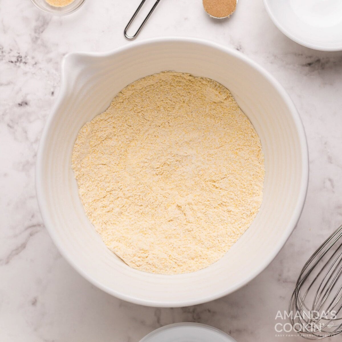 cornbread muffin mixture in bowl