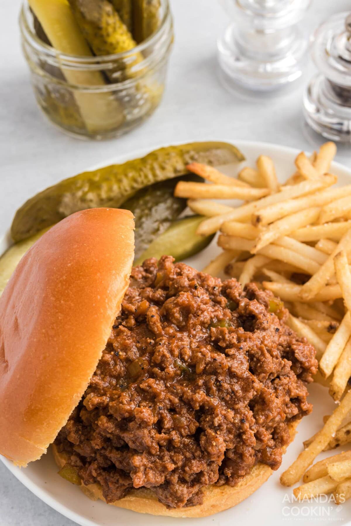 sloppy joes on a bun with fries