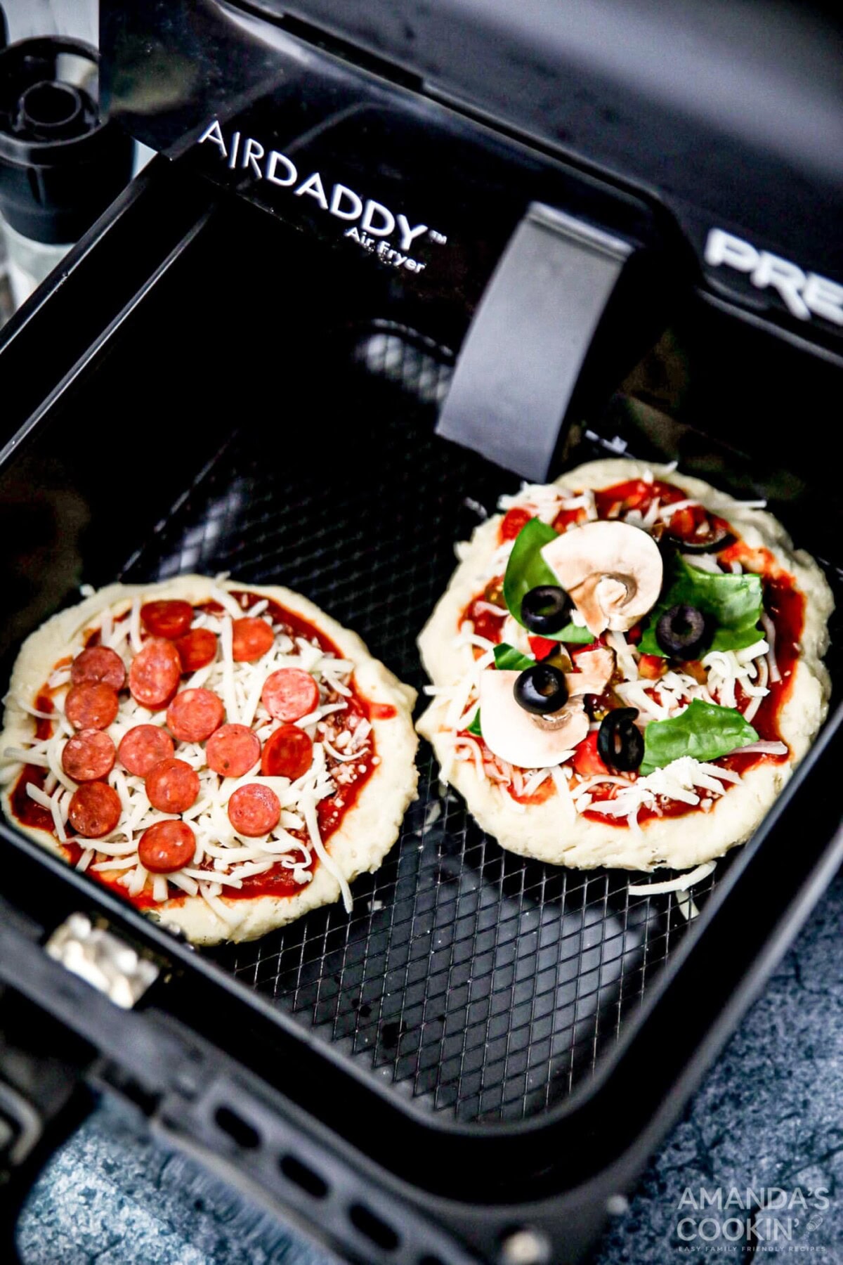 uncooked pizza in air fryer