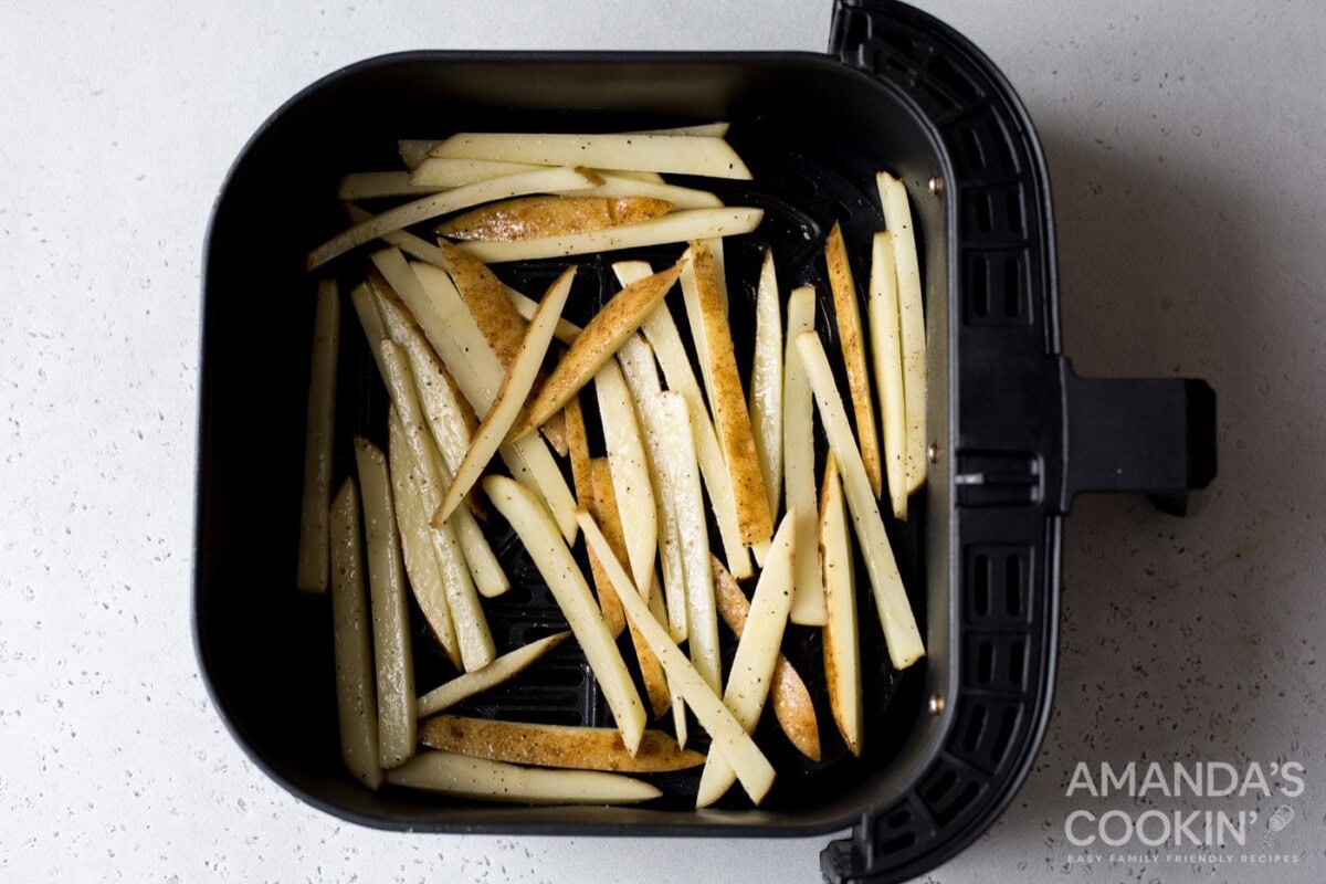 potato slices in air fryer basket
