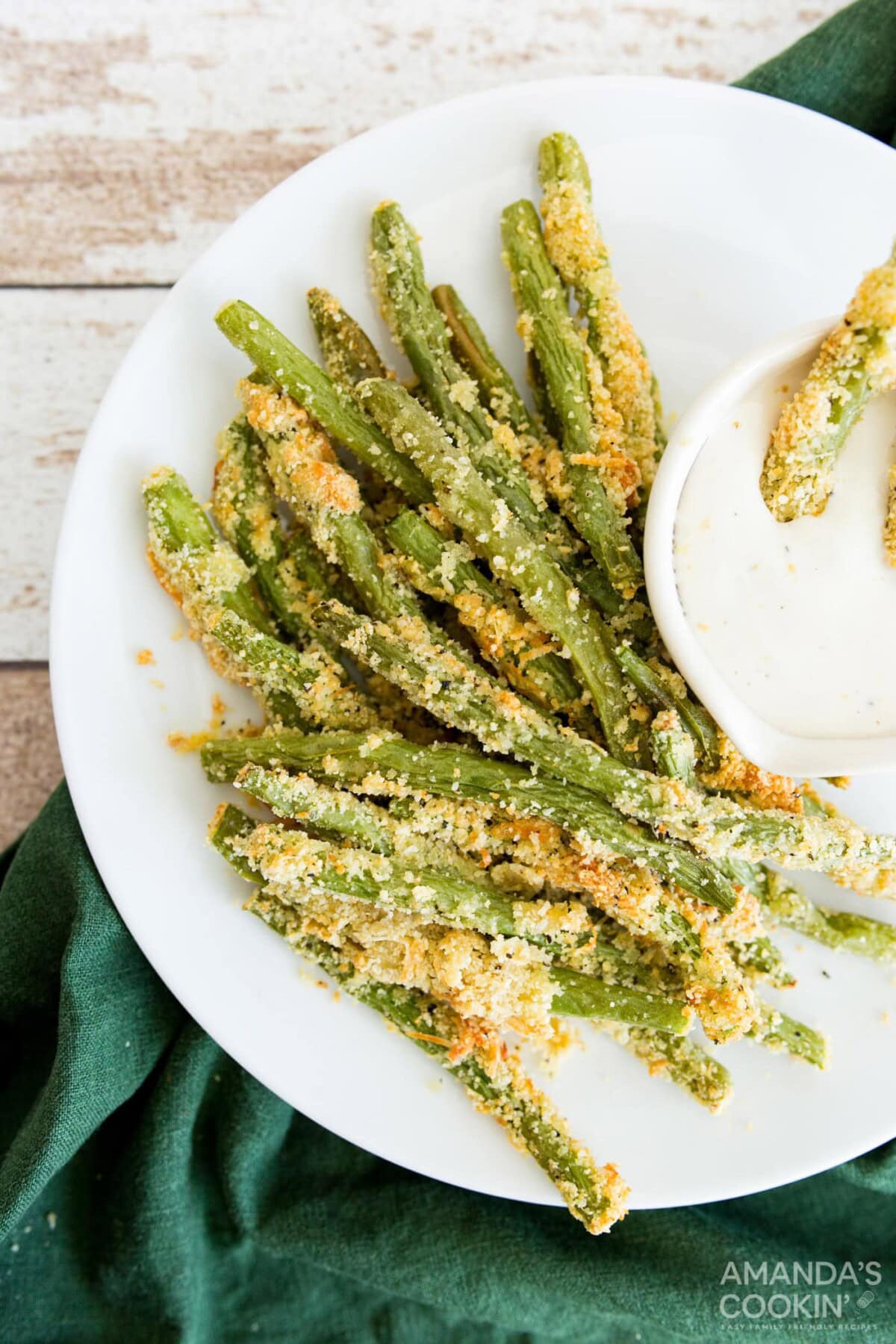 Air Fryer Green Bean Fries on a plate with dip