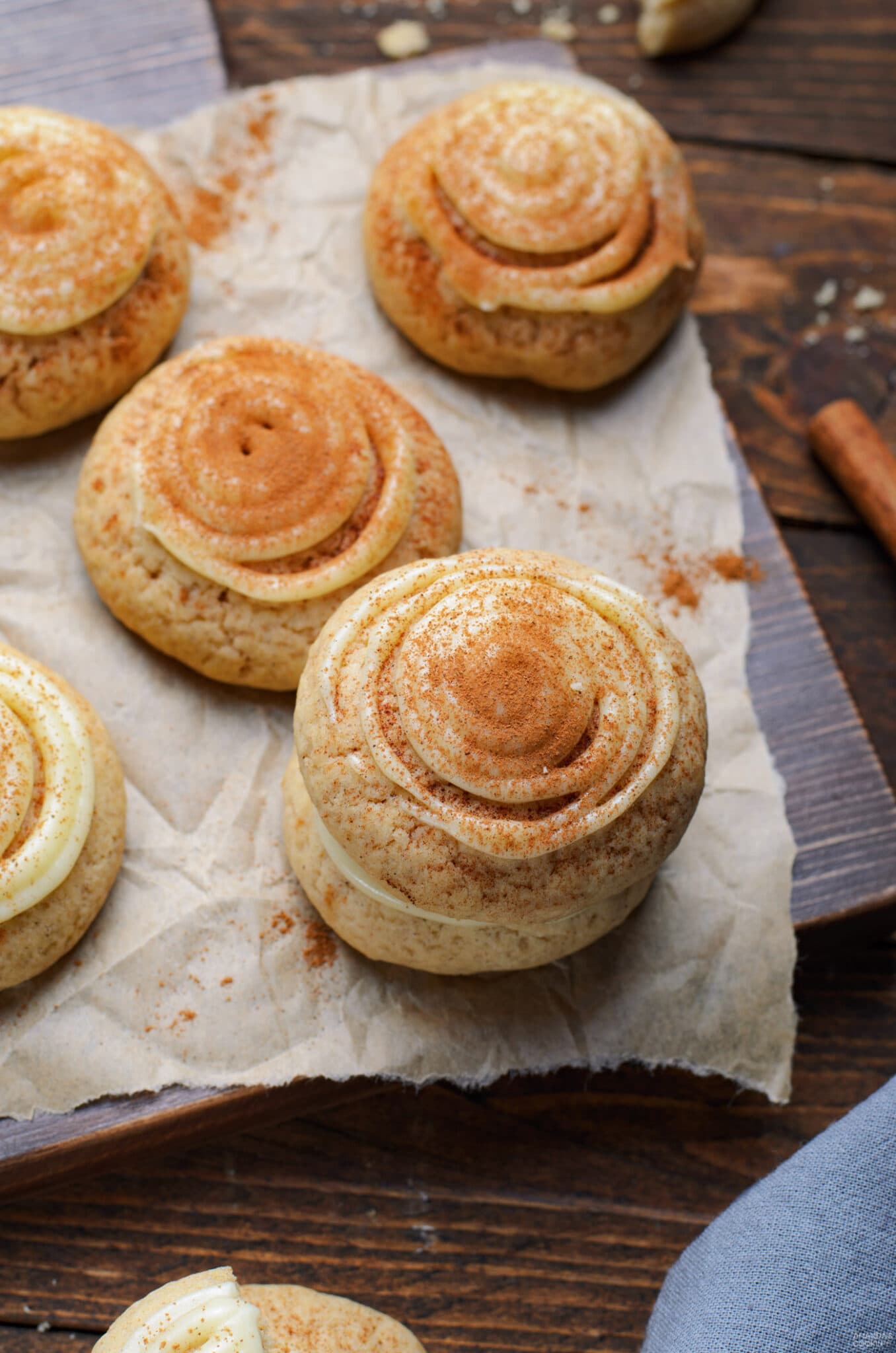 cinnamon roll cookies on parchment