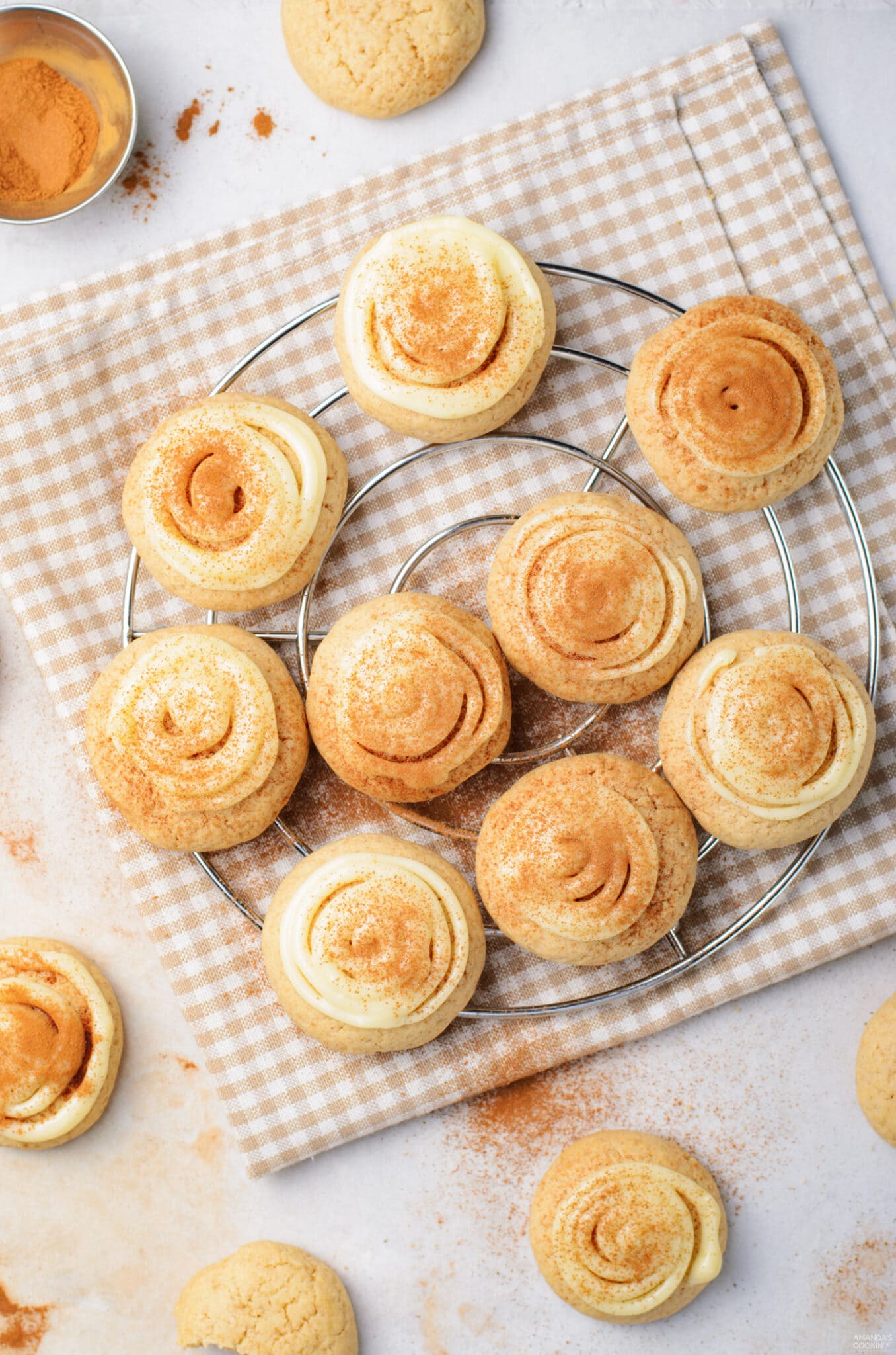 cinnamon roll cookies on a cooling rack