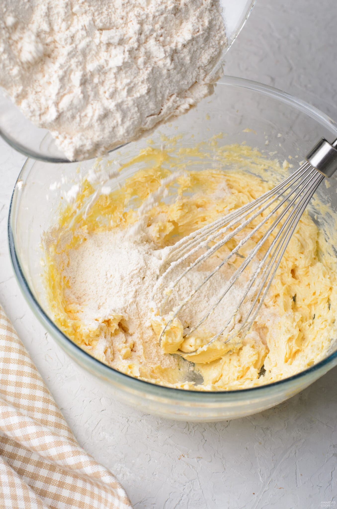adding dry ingredients to wet ingredients