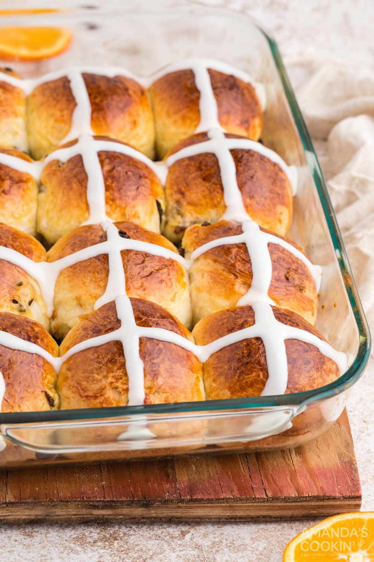 a glass pan of Hot Cross Buns