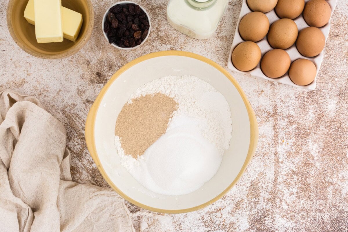 Sugar, yeast, and flour in mixing bowl