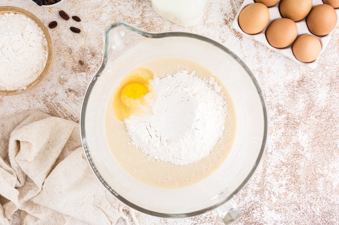 egg and two flour added to mixer bowl