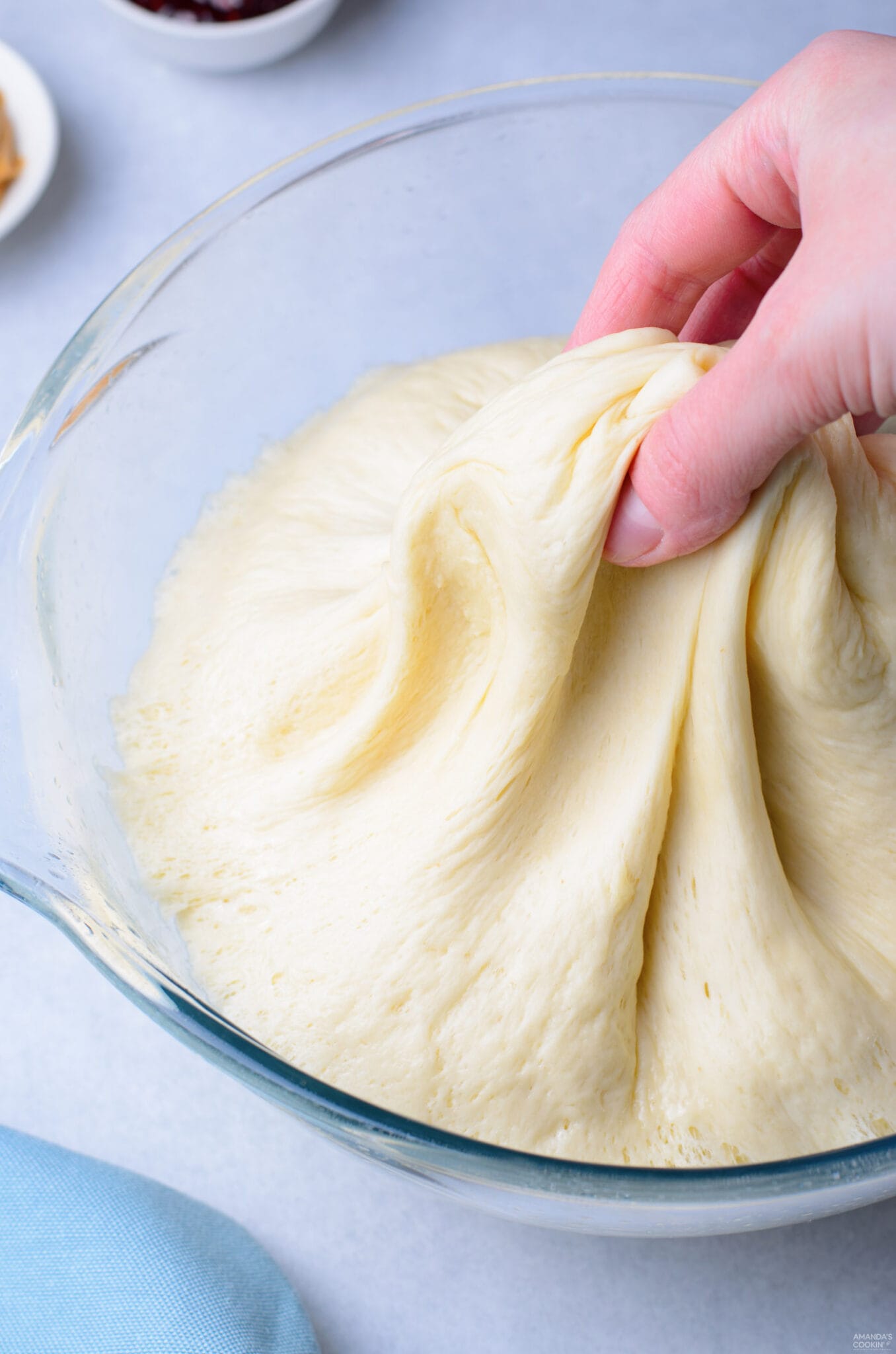 pinching donut dough