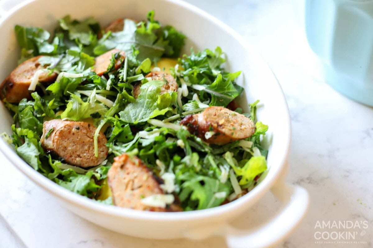 chicken sausage and kale in a casserole dish