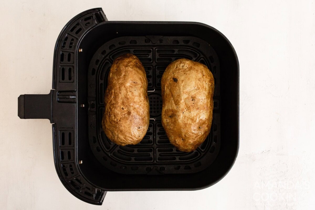 cooked russet potatoes in air fryer basket