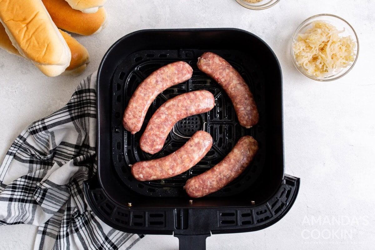 bratwurst in an air fryer tray